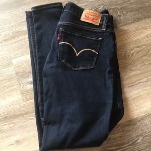 Levi super skinny jeans, dark wash.
